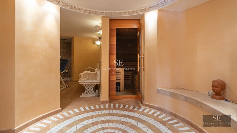 Exterior view of a modern villa with a pool. Minimalist design, large windows, manicured landscaping. Reflections in the water.