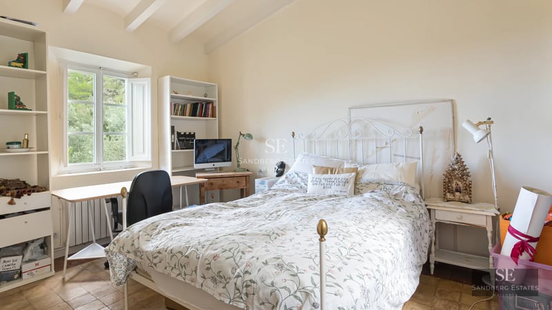 Modern interior with balcony and sea view. Elegant furniture, natural light and minimalist design. Large windows and high-quality materials.