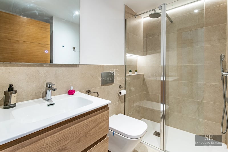 Expansive terrace with infinity pool offering panoramic views. Modern design, stylish outdoor furniture, and lush landscaping.