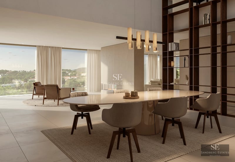 Modern balcony with glass railing offering panoramic sea views. Minimalist furniture, wooden floor and elegant design.