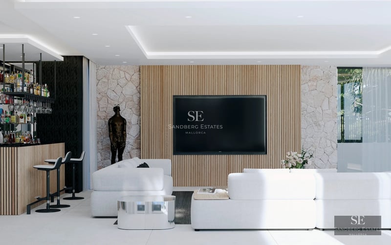 Spacious, bright living room with large windows, modern furniture, and access to a terrace with spectacular views.