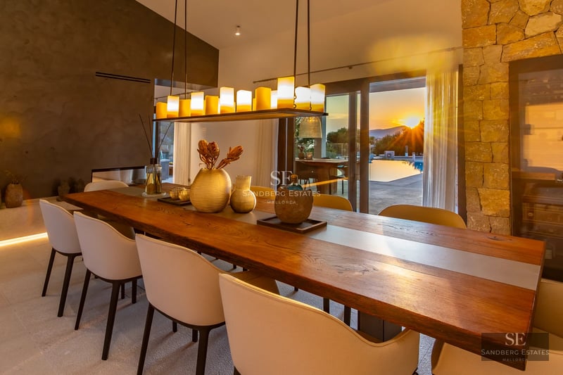 Spacious terrace with infinity pool, panoramic views, sun loungers, and modern design. Ideal for relaxation and enjoying the outdoors.