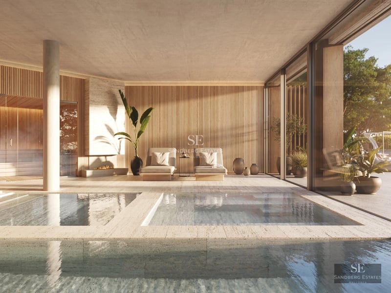 Image of a modern property with a pool, lush garden, and elegant architecture. Large windows maximize natural light.