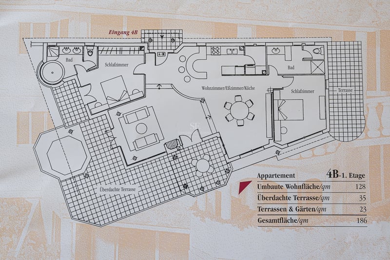 Expansive terrace with infinity pool, sun loungers, and panoramic views. Modern and minimalist design with a neutral color palette.