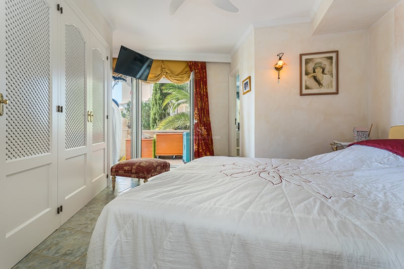 Exterior view of a modern villa with a pool, spacious garden, and panoramic sea views. Minimalist architecture, luxurious finishes.